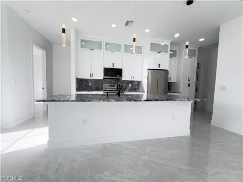 913 Glenn Ave, Lehigh Acres FL - photo 10 of 41
