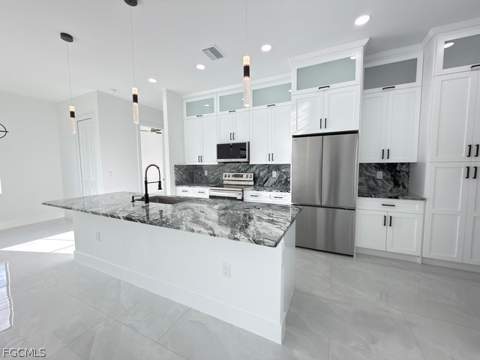 913 Glenn Ave, Lehigh Acres FL - photo 9 of 41