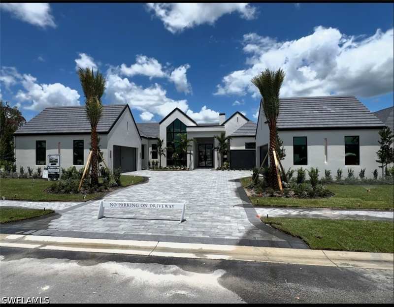 4 bedroom SingleFamilyResidence at 948 Chimney Rock Rd, Opus Stone, Naples — photo 1