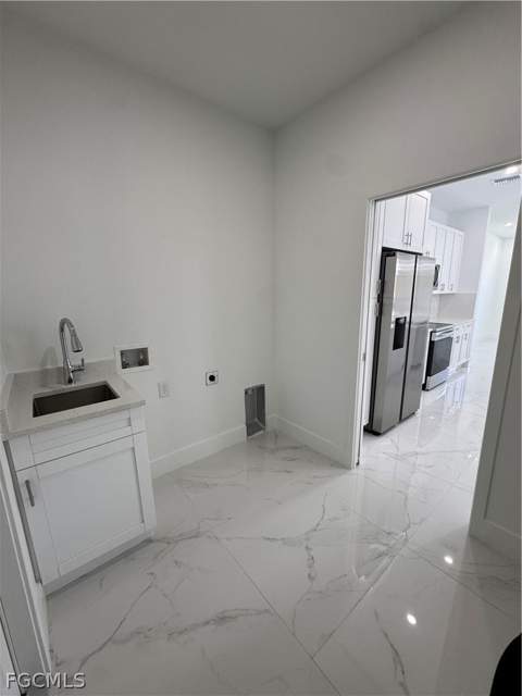 724 Kari Cir, Lehigh Acres FL - photo 10 of 36