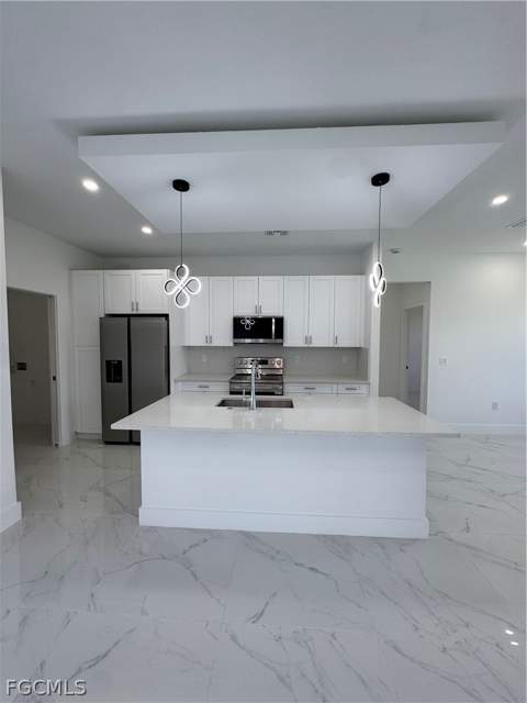 724 Kari Cir, Lehigh Acres FL - photo 7 of 36
