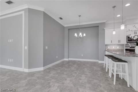 6933 Saona Ct, Naples FL - photo 13 of 44
