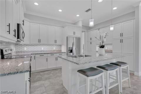 6933 Saona Ct, Naples FL - photo 9 of 44