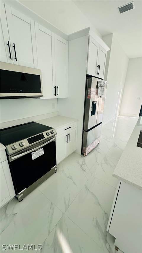 2614 12th St SW, Lehigh Acres FL - photo 10 of 29