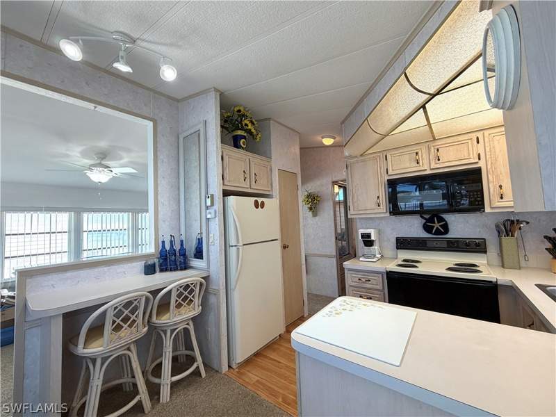 2 bedroom ManufacturedHome at 4740 Slash Pine Way W, Riverwoods Plantation, Estero — photo 3