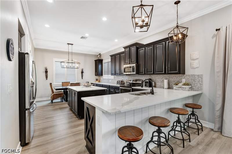 5 bedroom SingleFamilyResidence at 3061 Scarlet Oak Pl, Moody River Estates, North Fort Myers — photo 2