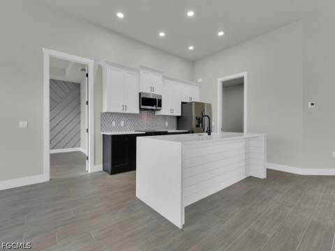 1517 NW 21st Pl, Cape Coral FL - photo 11 of 36
