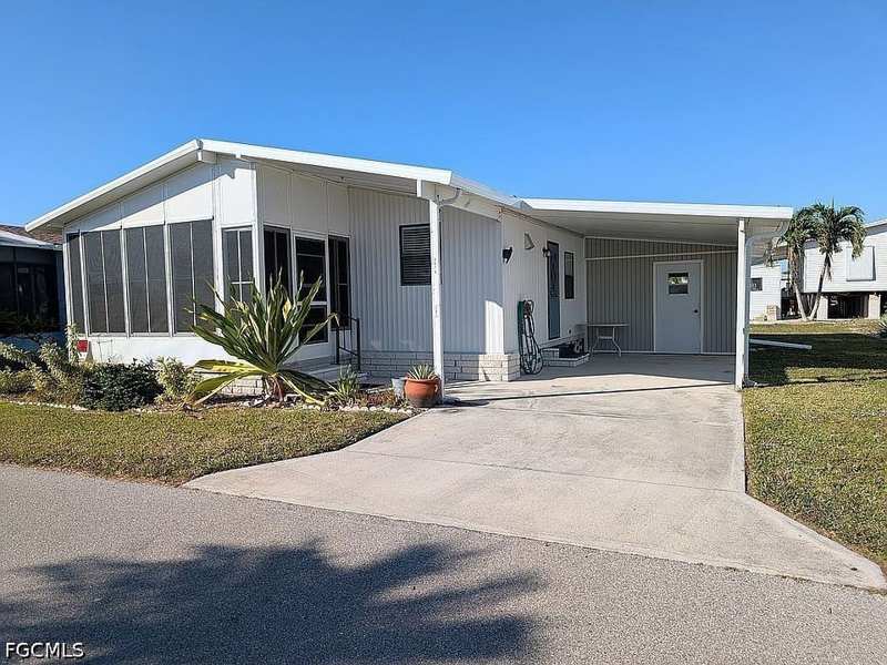 2 bedroom ManufacturedHome at 4978 Mullette Ln, Pine Island Cove, St James City — photo 1