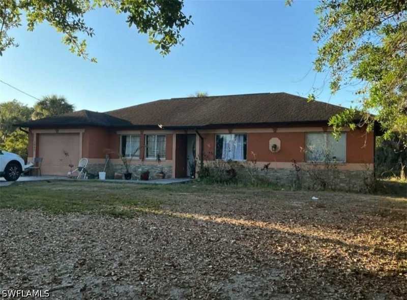 4 bedroom SingleFamilyResidence at 3440 22nd Ave NE, Golden Gate Estates, Naples — photo 1