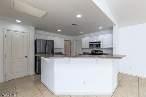 2814 Cerito Ave N, Lehigh Acres FL - photo 6 of 27
