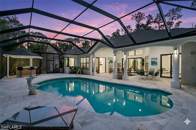 6 bedroom SingleFamilyResidence at 4075 1st Ave SW, Collier Woods, Naples — photo 2