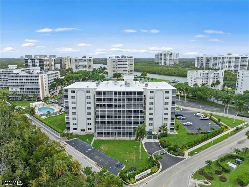 bedroom Condominium at 1 Bluebill Ave 402, Vanderbilt Towers, Naples — photo 1