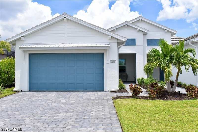 2 bedroom Attached at 9175 Cayman Dr, Azure At Hacienda Lakes, Naples — photo 1