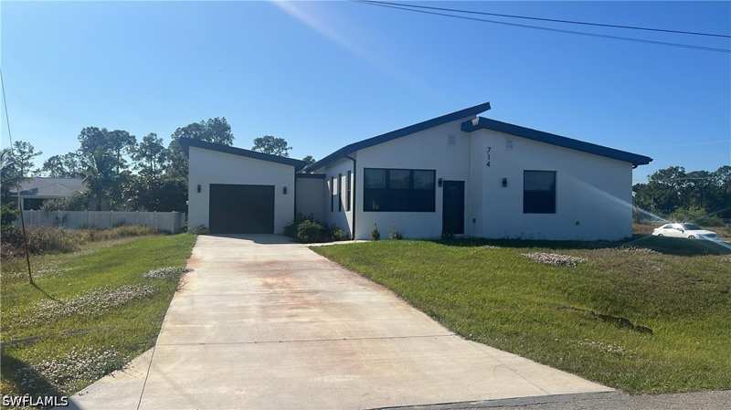 3 bedroom SingleFamilyResidence at 714 Chambers St E, Mirror Lakes, Lehigh Acres — photo 1