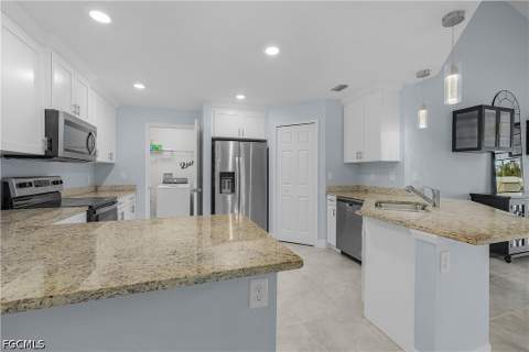 1012 Calvin Ave, Lehigh Acres FL - photo 8 of 39