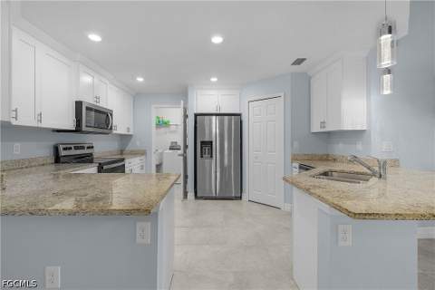 1012 Calvin Ave, Lehigh Acres FL - photo 9 of 39