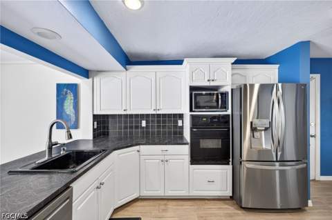 4547 SE 11th Ave, Cape Coral FL - photo 6 of 26