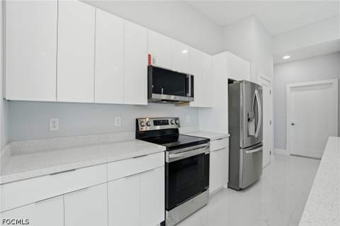 431 Palmyra Ave, Lehigh Acres FL - photo 10 of 44
