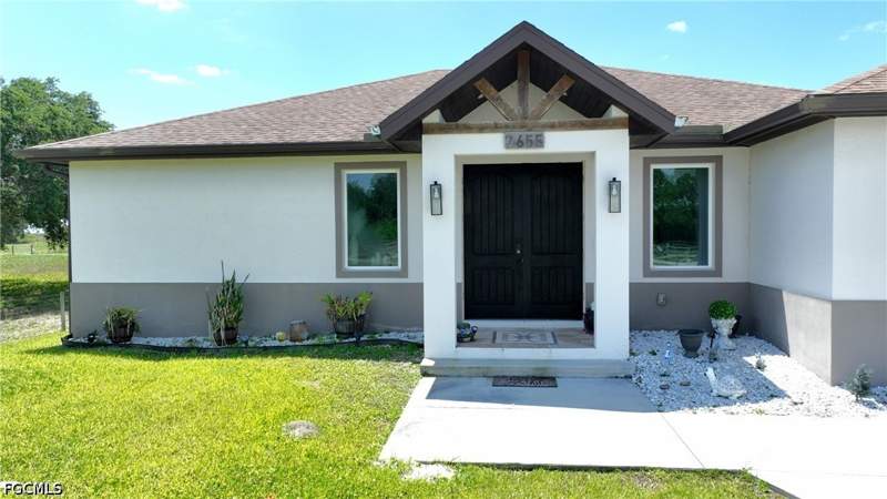 3 bedroom SingleFamilyResidence at 7655 17th Pl, Wheelers Subd, Labelle — photo 2