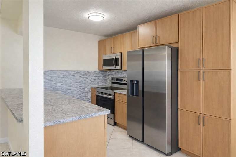 2 bedroom Condominium at 4625 Bayshore Dr D1, Abaco Bay, Naples — photo 1