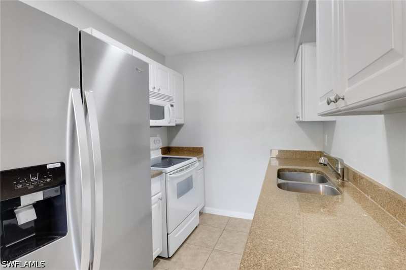 2 bedroom Condominium at 4635 Bayshore Dr P4, Abaco Bay, Naples — photo 1
