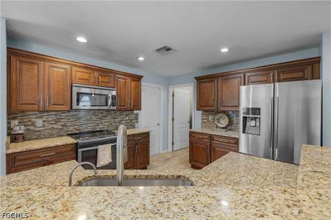 3928 NW 41st Pl, Cape Coral FL - photo 12 of 37