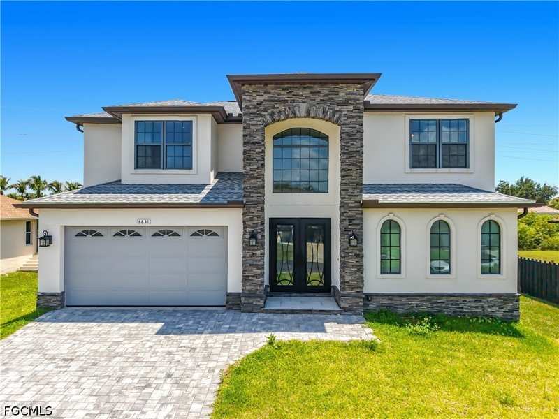 5 bedroom SingleFamilyResidence at 8831 Woodgate Dr, Woodgate Estates, Fort Myers — photo 1
