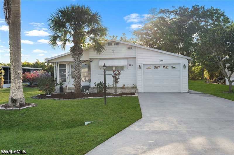 2 bedroom ManufacturedHome at 146 Rookery Rd, Riverwood, Naples — photo 1