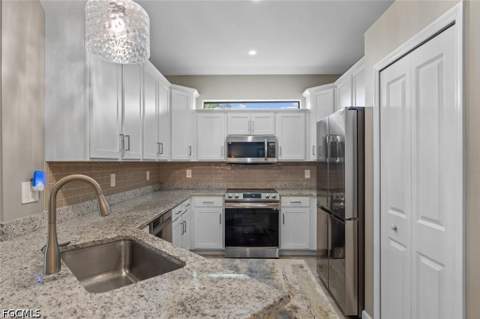 14045 Winding Cedar Way, Fort Myers FL - photo 17 of 49