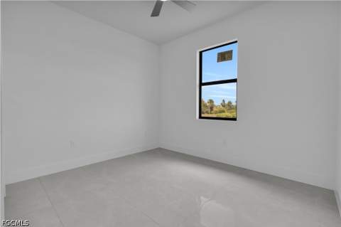 913 Mildred Ave S, Lehigh Acres FL - photo 12 of 39
