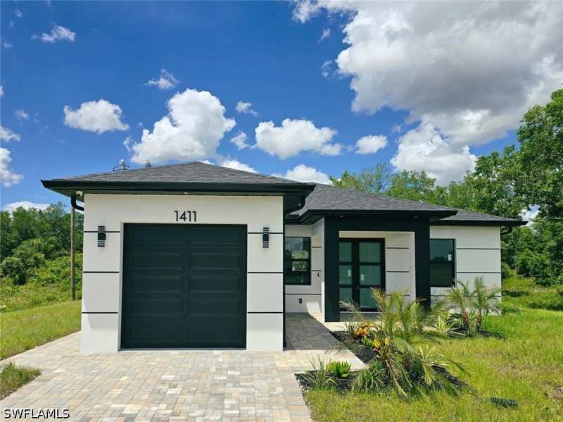 3 bedroom SingleFamilyResidence at 1411 Moore Ave, Lehigh Acres, Lehigh Acres — photo 1