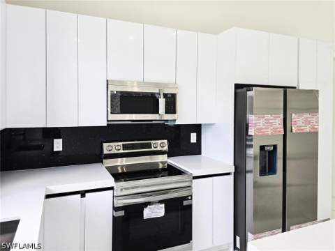 1411 Moore Ave, Lehigh Acres FL - photo 13 of 48