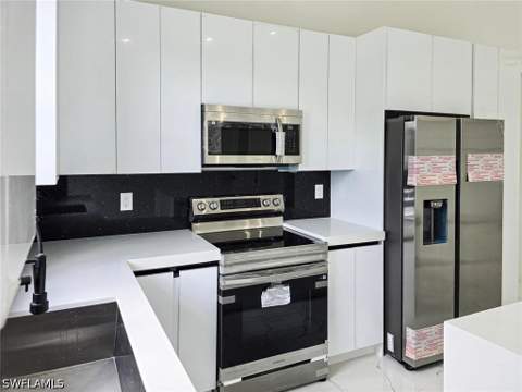 1411 Moore Ave, Lehigh Acres FL - photo 15 of 48