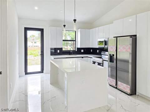 1411 Moore Ave, Lehigh Acres FL - photo 9 of 48