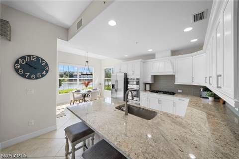 8030 Signature Club Cir 102, Naples FL - photo 8 of 46