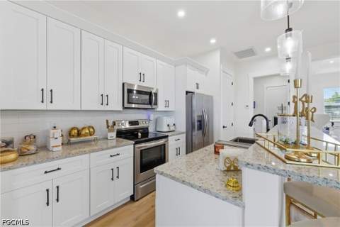 3046 NW 2nd Pl, Cape Coral FL - photo 9 of 32