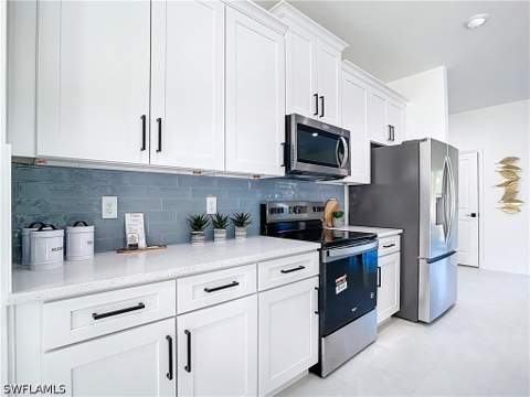 422 Eisenhower Blvd, Lehigh Acres FL - photo 10 of 43