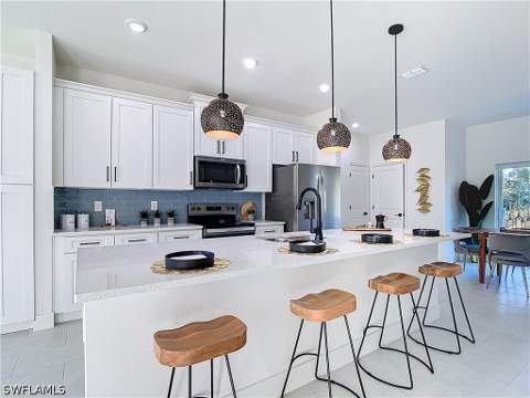 422 Eisenhower Blvd, Lehigh Acres FL - photo 6 of 43