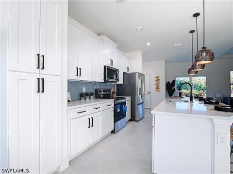 422 Eisenhower Blvd, Lehigh Acres FL - photo 7 of 43