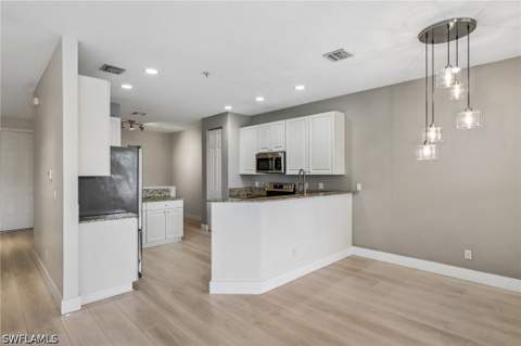 1410 Mariposa Cir 102, Naples FL - photo 11 of 50