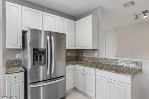 1410 Mariposa Cir 102, Naples FL - photo 8 of 50