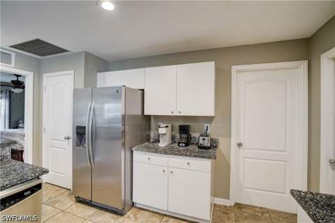 1427 NE Juanita Pl, Cape Coral FL - photo 10 of 28