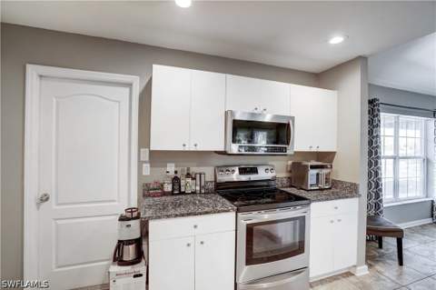 1427 NE Juanita Pl, Cape Coral FL - photo 9 of 28