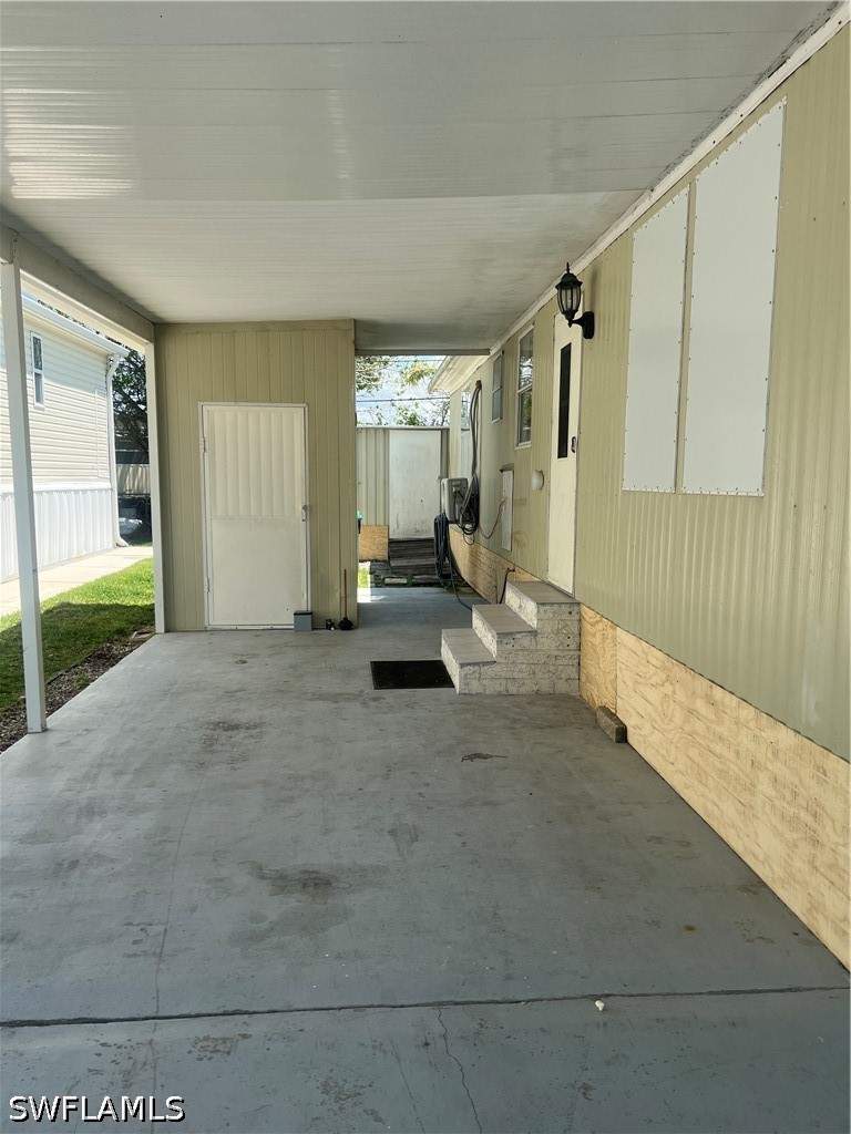 2 bedroom ManufacturedHome at 777 Walkerbilt Rd 9, Riverbend Mobile Home Park, Naples — photo 2