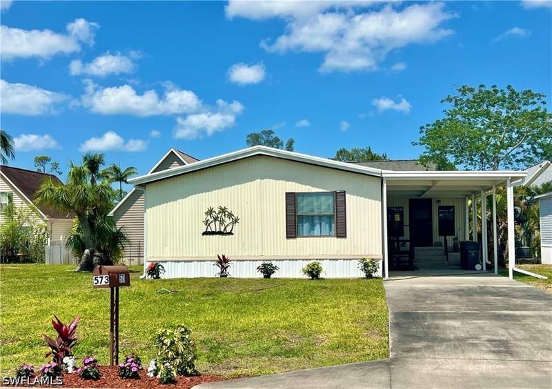 3 bedroom ManufacturedHome at 573 Cape Florida Ln, Naples Mobile Estates, Naples — photo 2