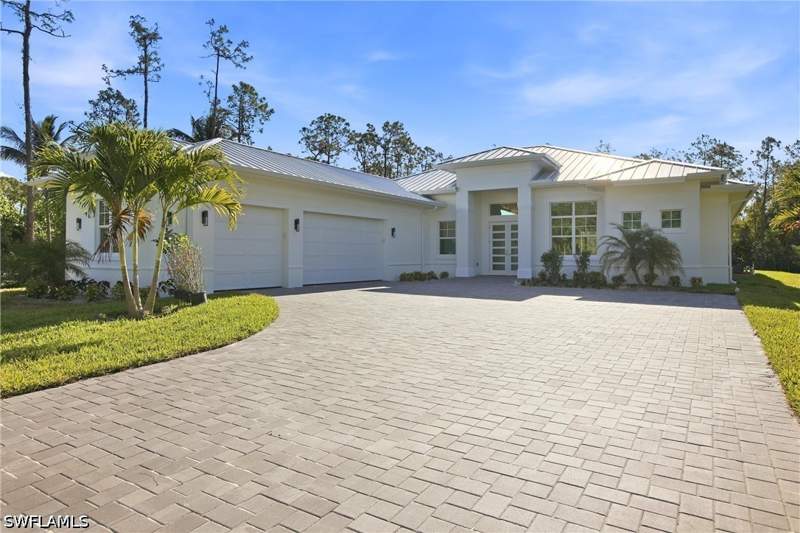 4 bedroom SingleFamilyResidence at 24265 Cock Robin Ln, San Carlos Estates, Bonita Springs — photo 2