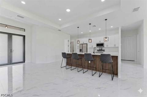 718 Phelps St E, Lehigh Acres FL - photo 6 of 29