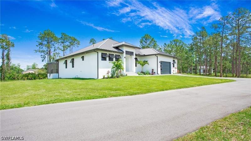 6 bedroom SingleFamilyResidence at 2343 Oil Well Rd, Golden Gate Estates, Naples — photo 2