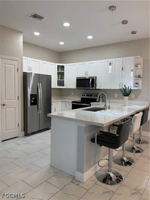 209 Nelson Rd N, Cape Coral FL - photo 8 of 32