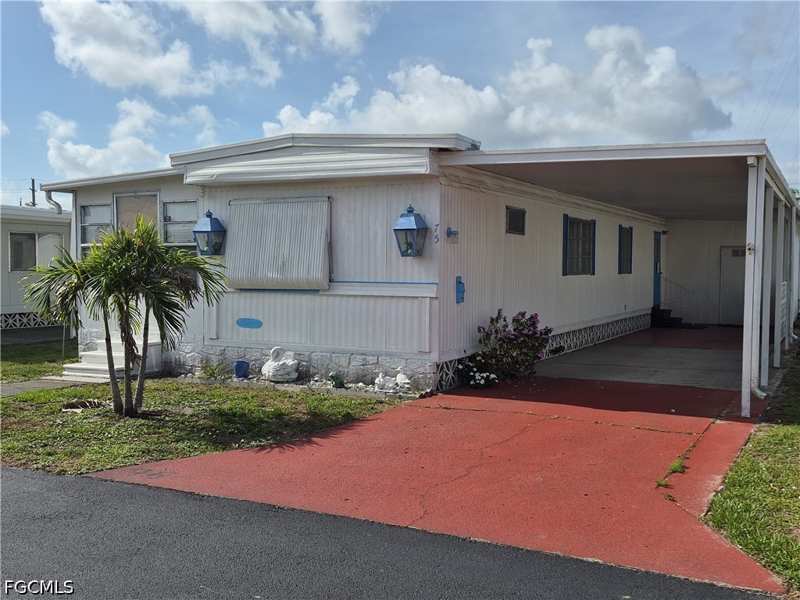2 bedroom ManufacturedHome at 75 Hacienda Blvd, Poinsettia Park Mobile Home Co-Op Inc, Fort Myers — photo 1